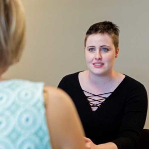 close up of stephanie talking to kris