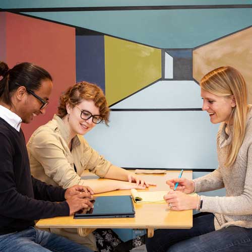 roshan, claire, and maggie working together