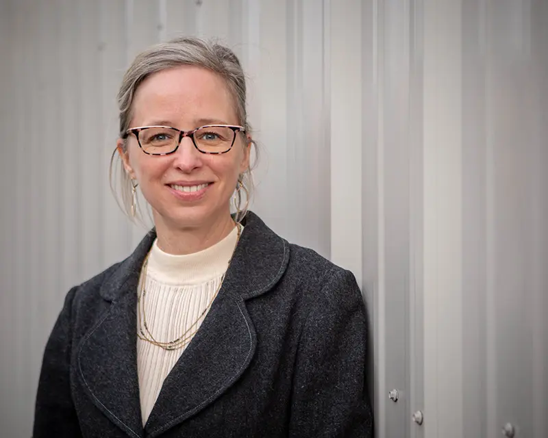 A portrait of Kris Skavish, Co-CEO of Two Octobers